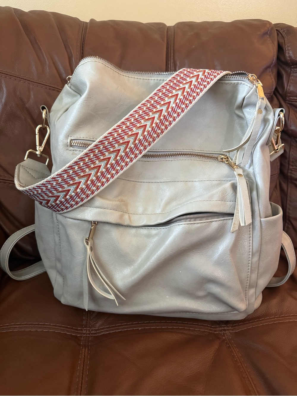 Grey Vegan Leather Backpack Tote with Detachable Strap and Zippered Pockets